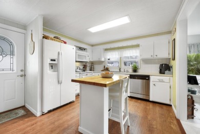 This furnished 2 bedroom, 2 bathroom home is situated on an on Maple Leaf Golf and Country Club in Florida - for sale on GolfHomes.com, golf home, golf lot