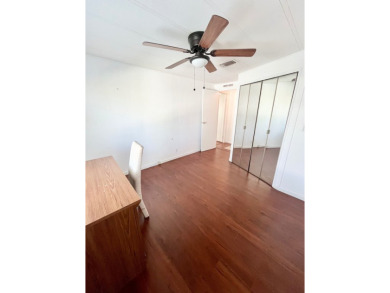 Enjoy water views from this beautiful 2-bedroom, 2-bathroom home on Lake Fairways Country Club in Florida - for sale on GolfHomes.com, golf home, golf lot