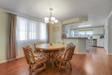 This furnished 2 bedroom, 2 bathroom home is situated on an on Maple Leaf Golf and Country Club in Florida - for sale on GolfHomes.com, golf home, golf lot