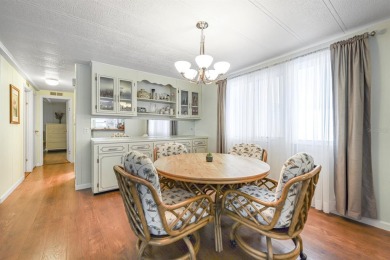 This furnished 2 bedroom, 2 bathroom home is situated on an on Maple Leaf Golf and Country Club in Florida - for sale on GolfHomes.com, golf home, golf lot