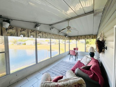 Enjoy water views from this beautiful 2-bedroom, 2-bathroom home on Lake Fairways Country Club in Florida - for sale on GolfHomes.com, golf home, golf lot
