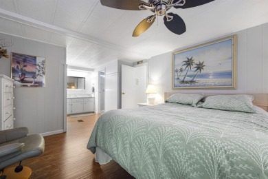 This furnished 2 bedroom, 2 bathroom home is situated on an on Maple Leaf Golf and Country Club in Florida - for sale on GolfHomes.com, golf home, golf lot
