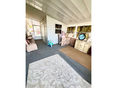 Enjoy water views from this beautiful 2-bedroom, 2-bathroom home on Lake Fairways Country Club in Florida - for sale on GolfHomes.com, golf home, golf lot