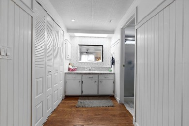 This furnished 2 bedroom, 2 bathroom home is situated on an on Maple Leaf Golf and Country Club in Florida - for sale on GolfHomes.com, golf home, golf lot