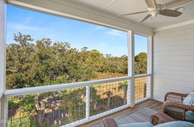 Enjoy coastal living with this charming 4-bedroom, 3-bathroom on Ocean Creek Golf Course in South Carolina - for sale on GolfHomes.com, golf home, golf lot