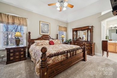 Nestled in the tranquil golf course landscape of Pine Island on Pine Island Country Club in North Carolina - for sale on GolfHomes.com, golf home, golf lot