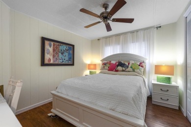 This furnished 2 bedroom, 2 bathroom home is situated on an on Maple Leaf Golf and Country Club in Florida - for sale on GolfHomes.com, golf home, golf lot