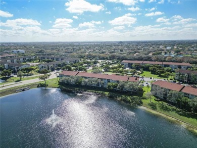 With breathtaking lake views and the soothing sound of a on Flamingo Lakes Country Club in Florida - for sale on GolfHomes.com, golf home, golf lot