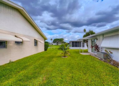 Discover this charming 2-bedroom, 2-bathroom villa in the on Cypress Lakes Golf Course - West Palm Beach in Florida - for sale on GolfHomes.com, golf home, golf lot