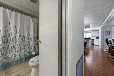 This furnished 2 bedroom, 2 bathroom home is situated on an on Maple Leaf Golf and Country Club in Florida - for sale on GolfHomes.com, golf home, golf lot