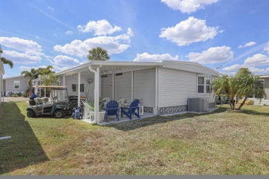 This furnished 2 bedroom, 2 bathroom home is situated on an on Maple Leaf Golf and Country Club in Florida - for sale on GolfHomes.com, golf home, golf lot