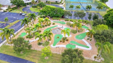 Discover this charming 2-bedroom, 2-bathroom villa in the on Cypress Lakes Golf Course - West Palm Beach in Florida - for sale on GolfHomes.com, golf home, golf lot