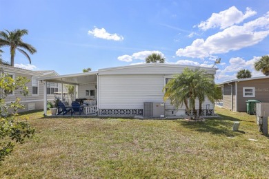This furnished 2 bedroom, 2 bathroom home is situated on an on Maple Leaf Golf and Country Club in Florida - for sale on GolfHomes.com, golf home, golf lot