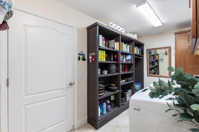 BOND PAID ON THIS BEAUTIFUL EXPANDED ELM DESIGNER 3 BR 2 BA + a on Pennbrooke Fairways in Florida - for sale on GolfHomes.com, golf home, golf lot