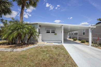 This furnished 2 bedroom, 2 bathroom home is situated on an on Maple Leaf Golf and Country Club in Florida - for sale on GolfHomes.com, golf home, golf lot