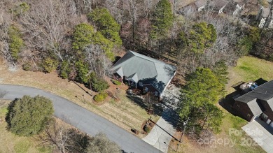Nestled in the tranquil golf course landscape of Pine Island on Pine Island Country Club in North Carolina - for sale on GolfHomes.com, golf home, golf lot