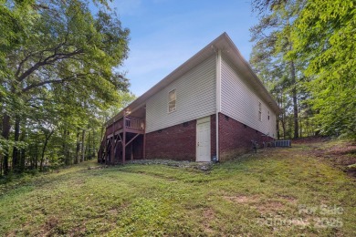 Nestled in the tranquil golf course landscape of Pine Island on Pine Island Country Club in North Carolina - for sale on GolfHomes.com, golf home, golf lot