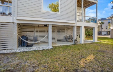 Enjoy coastal living with this charming 4-bedroom, 3-bathroom on Ocean Creek Golf Course in South Carolina - for sale on GolfHomes.com, golf home, golf lot