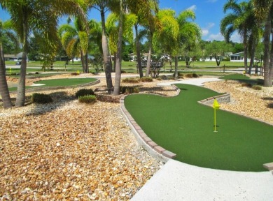 Discover this charming 2-bedroom, 2-bathroom villa in the on Cypress Lakes Golf Course - West Palm Beach in Florida - for sale on GolfHomes.com, golf home, golf lot