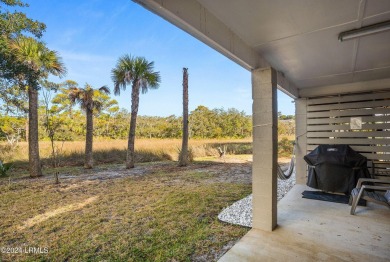 Enjoy coastal living with this charming 4-bedroom, 3-bathroom on Ocean Creek Golf Course in South Carolina - for sale on GolfHomes.com, golf home, golf lot