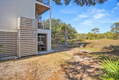 Enjoy coastal living with this charming 4-bedroom, 3-bathroom on Ocean Creek Golf Course in South Carolina - for sale on GolfHomes.com, golf home, golf lot