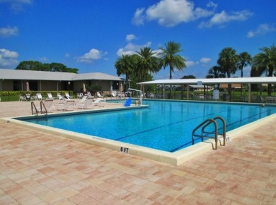 Discover this charming 2-bedroom, 2-bathroom villa in the on Cypress Lakes Golf Course - West Palm Beach in Florida - for sale on GolfHomes.com, golf home, golf lot