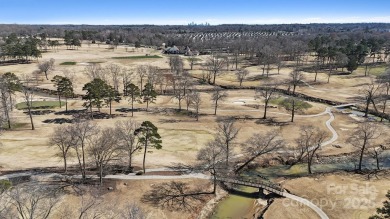 Nestled in the tranquil golf course landscape of Pine Island on Pine Island Country Club in North Carolina - for sale on GolfHomes.com, golf home, golf lot
