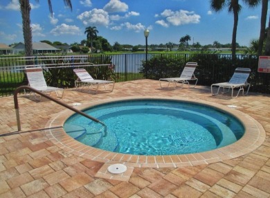 Discover this charming 2-bedroom, 2-bathroom villa in the on Cypress Lakes Golf Course - West Palm Beach in Florida - for sale on GolfHomes.com, golf home, golf lot