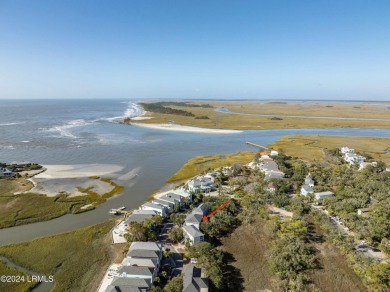 Enjoy coastal living with this charming 4-bedroom, 3-bathroom on Ocean Creek Golf Course in South Carolina - for sale on GolfHomes.com, golf home, golf lot