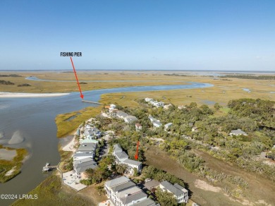 Enjoy coastal living with this charming 4-bedroom, 3-bathroom on Ocean Creek Golf Course in South Carolina - for sale on GolfHomes.com, golf home, golf lot