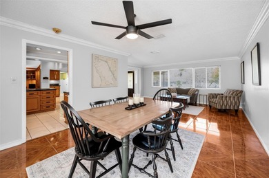 Welcome to an exceptional three-bedroom, two bath, one story on The Dunedin Country Club in Florida - for sale on GolfHomes.com, golf home, golf lot