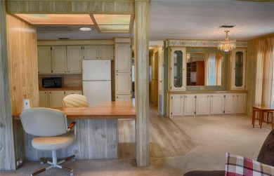This home sits on a corner lot near our 18-hole golf course. It on Barefoot Bay Golf Course in Florida - for sale on GolfHomes.com, golf home, golf lot