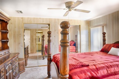 This home sits on a corner lot near our 18-hole golf course. It on Barefoot Bay Golf Course in Florida - for sale on GolfHomes.com, golf home, golf lot