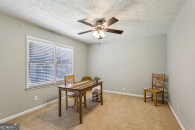 Tucked away on a large (over 1/2 acre lot) in the heart of on Indian Hills Country Club in Georgia - for sale on GolfHomes.com, golf home, golf lot