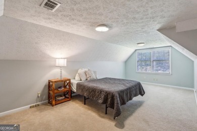 Tucked away on a large (over 1/2 acre lot) in the heart of on Indian Hills Country Club in Georgia - for sale on GolfHomes.com, golf home, golf lot
