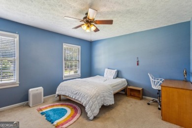 Tucked away on a large (over 1/2 acre lot) in the heart of on Indian Hills Country Club in Georgia - for sale on GolfHomes.com, golf home, golf lot