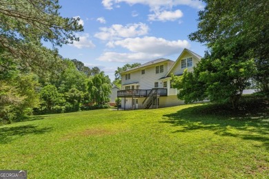 Tucked away on a large (over 1/2 acre lot) in the heart of on Indian Hills Country Club in Georgia - for sale on GolfHomes.com, golf home, golf lot