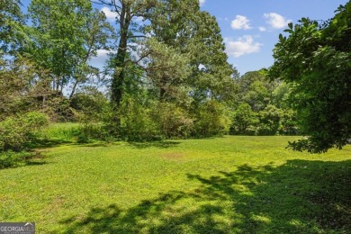 Tucked away on a large (over 1/2 acre lot) in the heart of on Indian Hills Country Club in Georgia - for sale on GolfHomes.com, golf home, golf lot