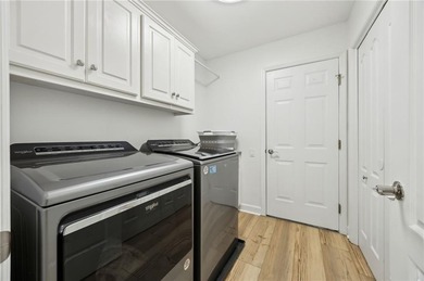 THIS BEAUTIFULLY UPDATED THREE-BEDROOM HOME IN OSPREY COVE IS on The Club At Osprey Cove in Georgia - for sale on GolfHomes.com, golf home, golf lot