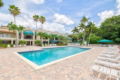 3/2 CONDO IN THE DESIRABLE PINE ISLAND RIDGE. PRIVATE COUNTRY on Pine Island Ridge Country Club in Florida - for sale on GolfHomes.com, golf home, golf lot