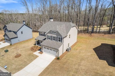 Escape the hustle and bustle in the newly opened phase at on Traditions of Braselton Golf Club in Georgia - for sale on GolfHomes.com, golf home, golf lot