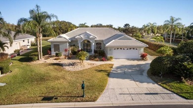 Tucked away among tree-lined streets and mature landscaping in on River Wilderness Golf and Country Club in Florida - for sale on GolfHomes.com, golf home, golf lot