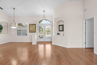 Tucked away among tree-lined streets and mature landscaping in on River Wilderness Golf and Country Club in Florida - for sale on GolfHomes.com, golf home, golf lot