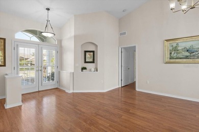 Tucked away among tree-lined streets and mature landscaping in on River Wilderness Golf and Country Club in Florida - for sale on GolfHomes.com, golf home, golf lot