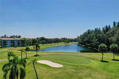 Enjoy beautiful golf course views from the large screened porch on Flamingo Lakes Country Club in Florida - for sale on GolfHomes.com, golf home, golf lot