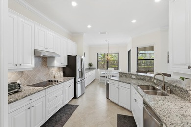 Experience tranquility in this beautiful estate home, nestled on on Plantation Golf and Country Club in Florida - for sale on GolfHomes.com, golf home, golf lot