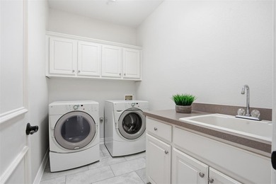 Dramatic entry welcomes you into elegant formal spaces accented on Timarron Country Club in Texas - for sale on GolfHomes.com, golf home, golf lot