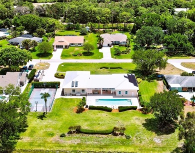 One-of-a-Kind TROPICAL Oasis! Hurricane-Safe Estate on 1+AC w/ on Island Pines Golf Club in Florida - for sale on GolfHomes.com, golf home, golf lot
