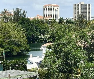 Experience living in a vibrant community with everything at your on Turnberry Isle Resort and Club in Florida - for sale on GolfHomes.com, golf home, golf lot