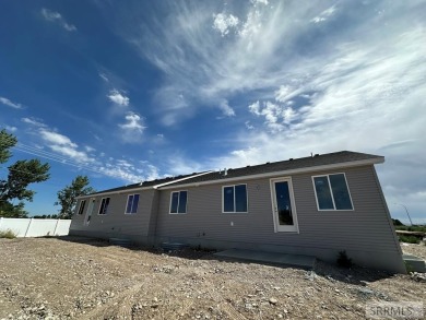 Prepare to be captivated! This brand-new 2025 twin home (2,824 on Sage Lakes Municipal Golf Course in Idaho - for sale on GolfHomes.com, golf home, golf lot